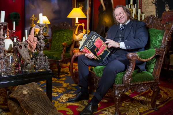 Bill G.B. Pallot, pictured here in his Paris home in 2017, has been at the center of a storm over counterfeit antique furniture. 