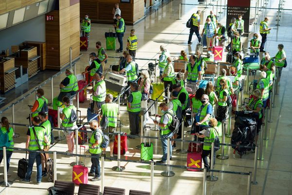 The volunteers were given suitcases to check in and pick up. The bags didn't always make it to carousel. 